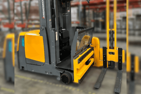 A Jungheinrich forklift operates in a warehouse, showcasing advanced navigation technology for precision and safety.